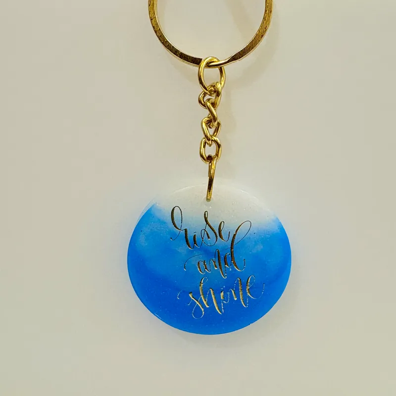 "Rise and Shine" Ombre Blue & White Resin Motivational Keychain