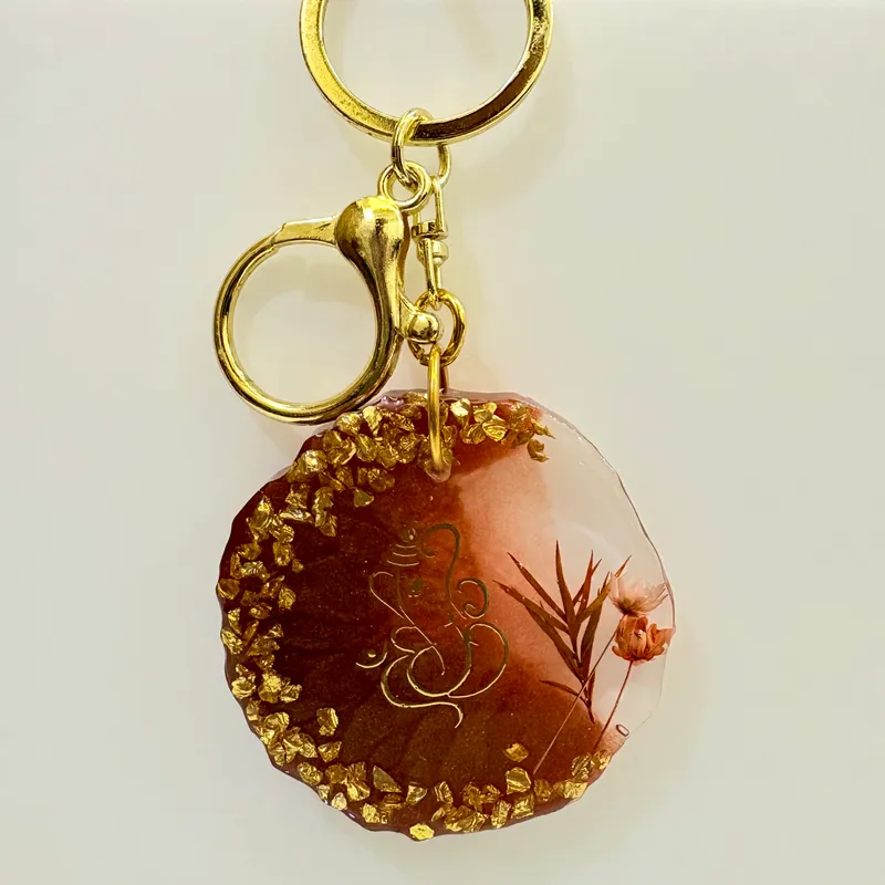 Divine Ganesha Gold & Floral Resin Geode Keychain
