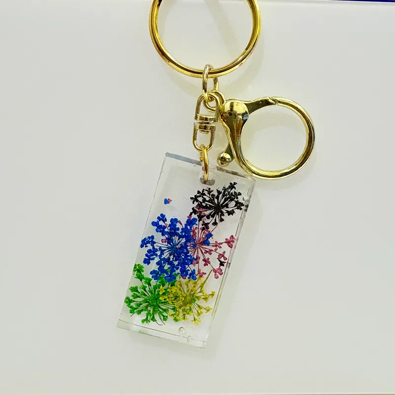 Rainbow Burst Pressed Flower Resin Keychain