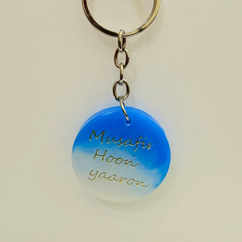 Musafir Hoon Yaaron Blue Resin Keychain